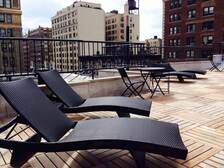 rooftop deck with lounge chairs